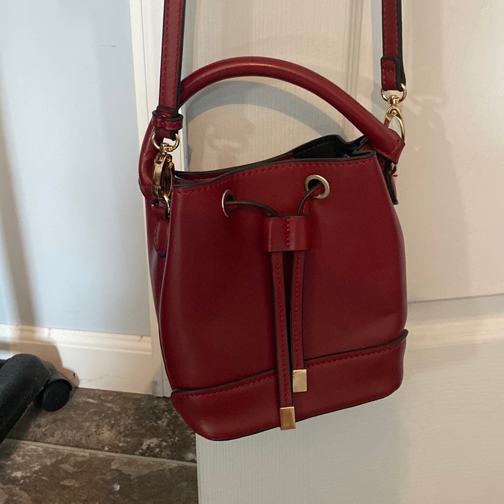 Red faux leather bucket bag